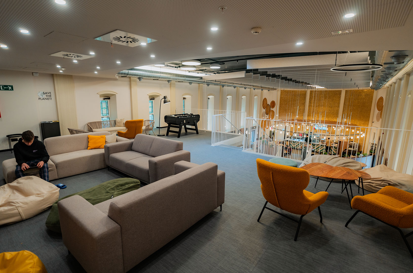 Student lounge with foosball and seating at Campus Bravo