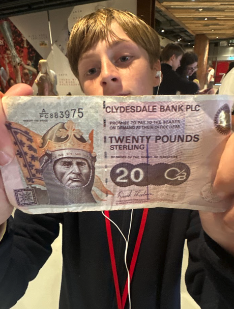 Young entrepreneur celebrating their first sale
